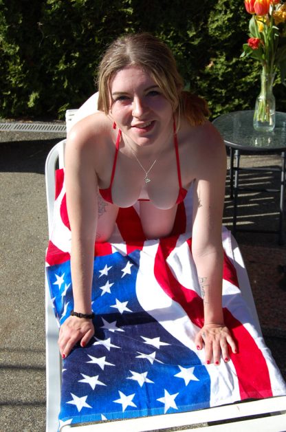 waving American flag beach towel 30x60 TW-040W on lounge chair